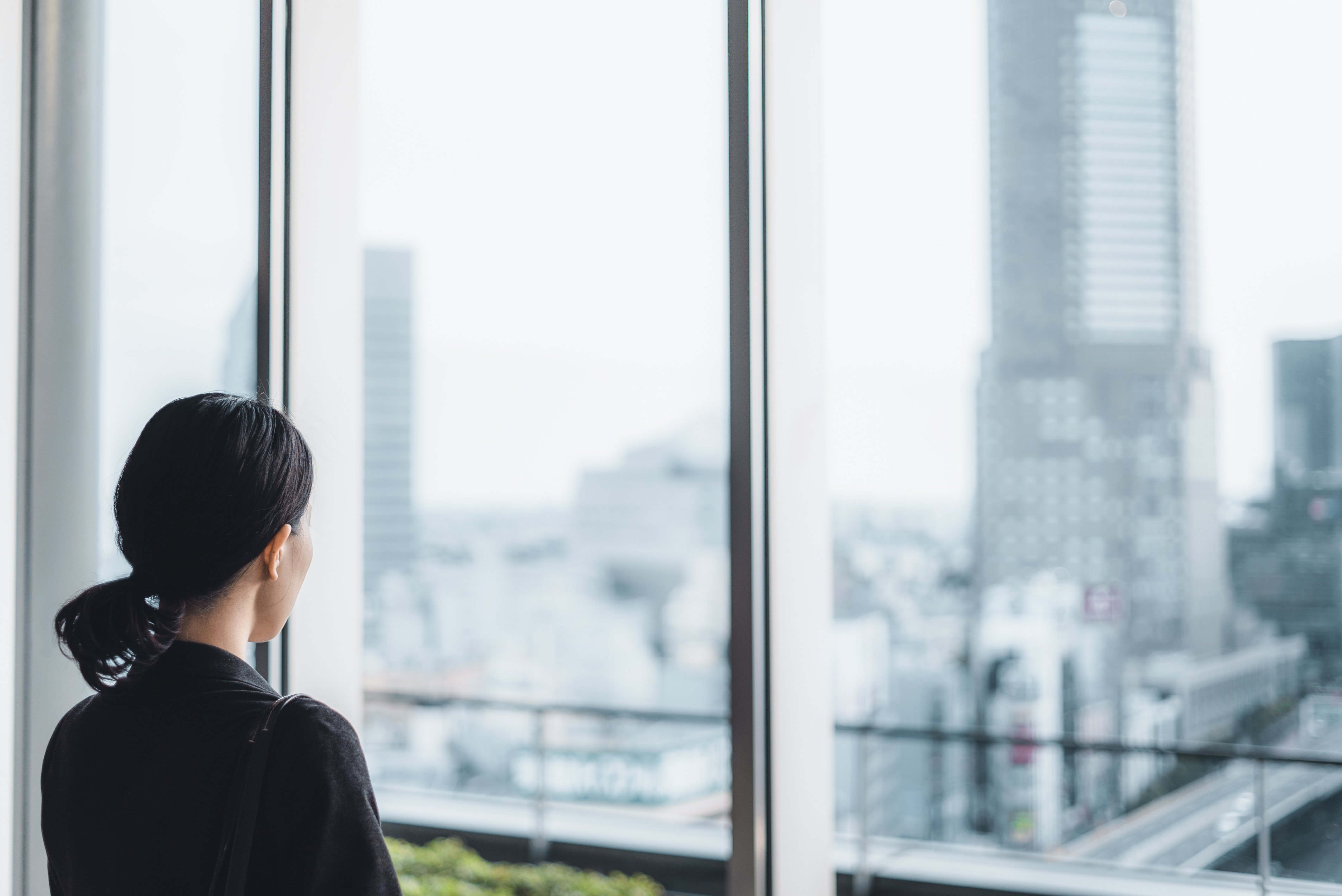 Business woman window