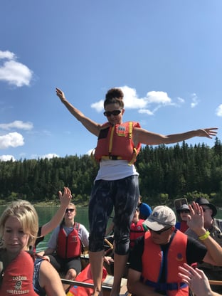 A trust building exercise on a voyageur canoes